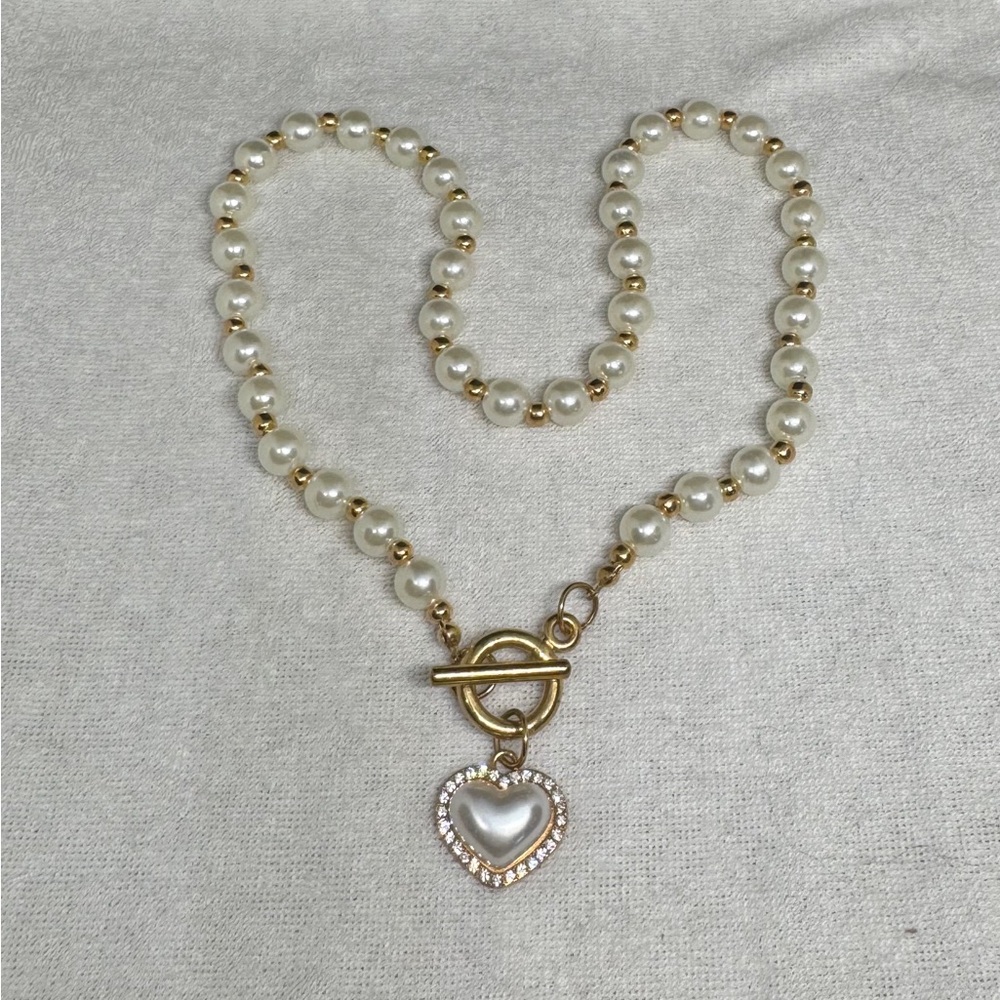 Elegant Gold and Silver Heart Pendant Necklace